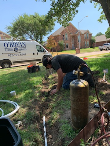 Plumber inspecting a sewer line in Allen, TX