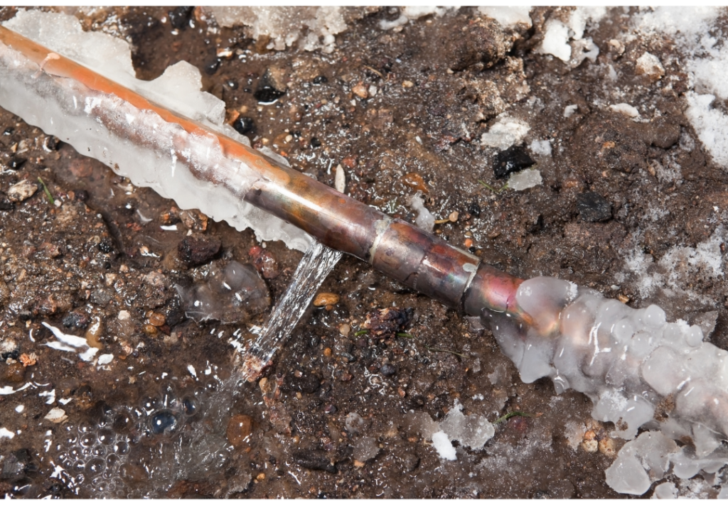 Pipe with ice surrounding it
